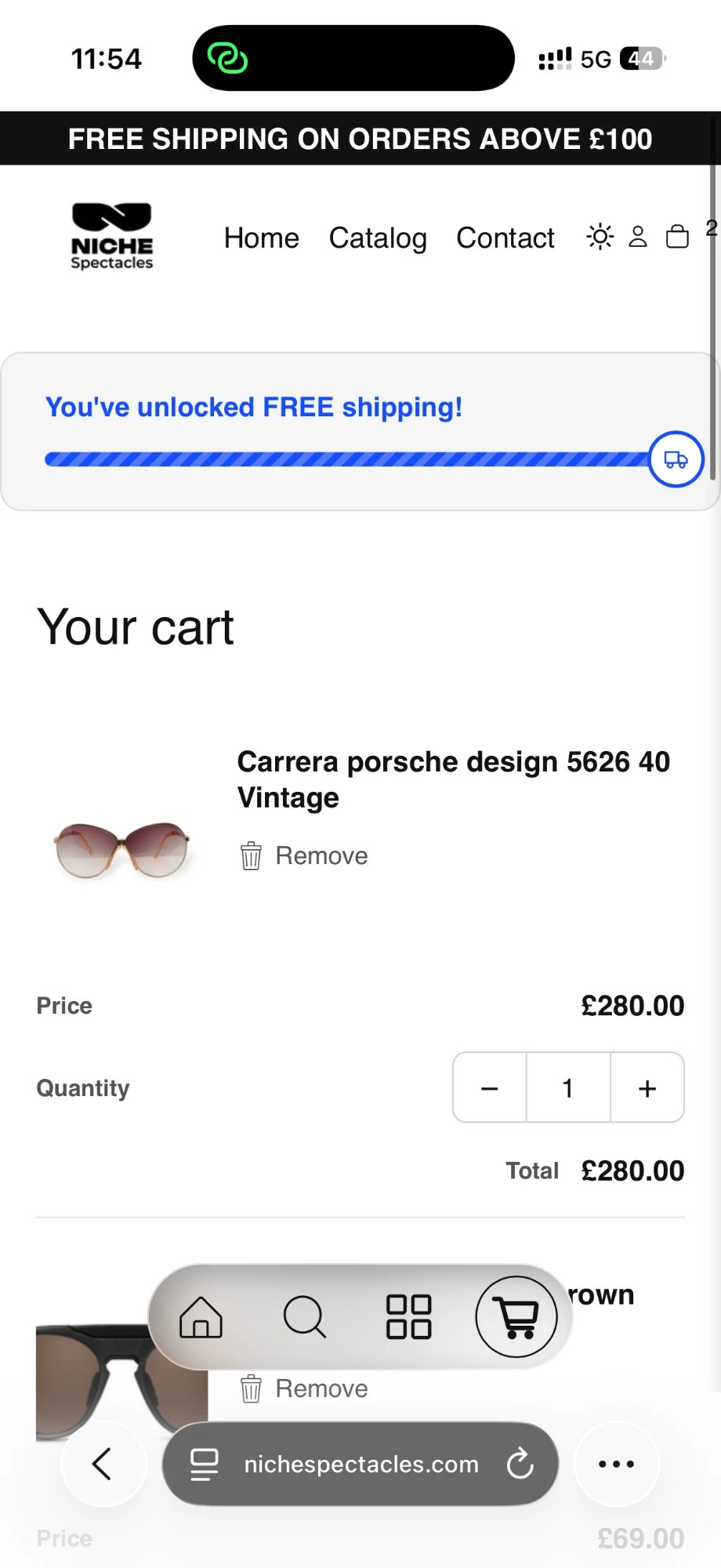 Niche Spectacles mobile cart showing prices in pounds and free UK shipping unlocked